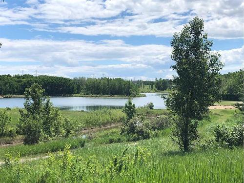 45 Lone Pine Crescent, Rural Rocky View County, AB - Outdoor With Body Of Water With View