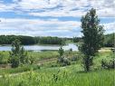 45 Lone Pine Crescent, Rural Rocky View County, AB  - Outdoor With Body Of Water With View 