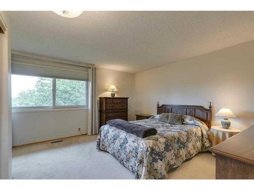 506 Silvergrove Drive Nw, Calgary, AB - Indoor Photo Showing Bedroom