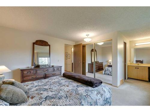 506 Silvergrove Drive Nw, Calgary, AB - Indoor Photo Showing Bedroom