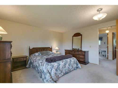 506 Silvergrove Drive Nw, Calgary, AB - Indoor Photo Showing Bedroom