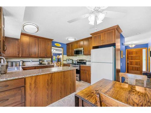 9308 26 Street Sw, Calgary, AB - Indoor Photo Showing Kitchen With Double Sink