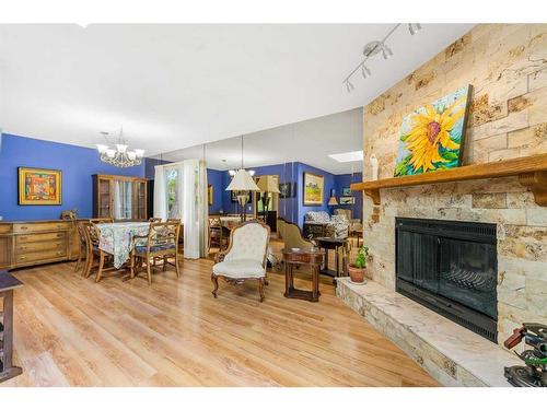 9308 26 Street Sw, Calgary, AB - Indoor Photo Showing Living Room With Fireplace