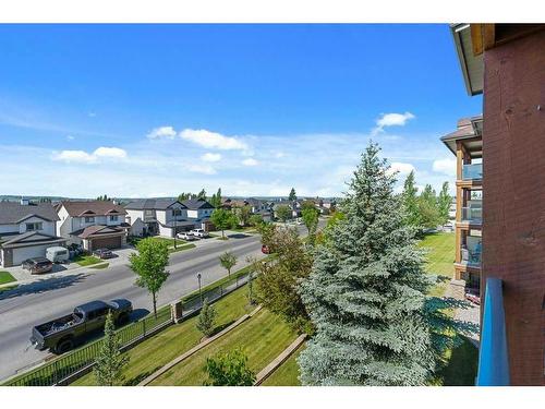 1310-92 Crystal Shores Road, Okotoks, AB - Outdoor With View