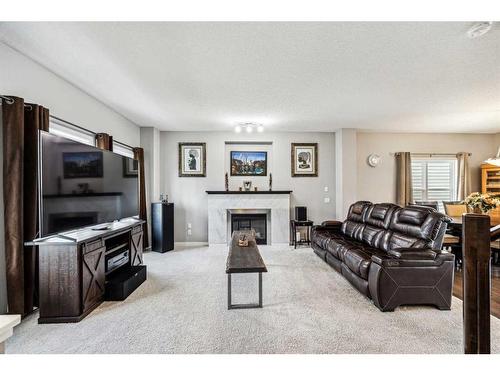 177 Legacy Crescent Se, Calgary, AB - Indoor Photo Showing Living Room With Fireplace