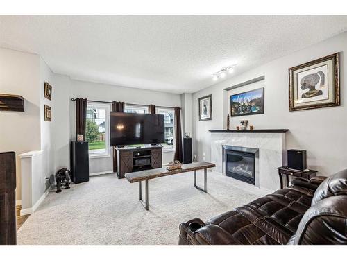 177 Legacy Crescent Se, Calgary, AB - Indoor Photo Showing Living Room With Fireplace