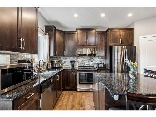 177 Legacy Crescent Se, Calgary, AB - Indoor Photo Showing Kitchen With Double Sink With Upgraded Kitchen