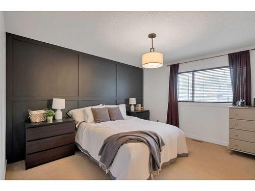 143 Sunvista Close Se, Calgary, AB - Indoor Photo Showing Bedroom