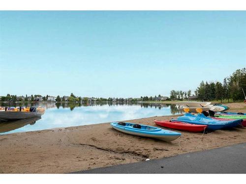 143 Sunvista Close Se, Calgary, AB - Outdoor With Body Of Water With View