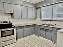 2412 44 Street Se, Calgary, AB  - Indoor Photo Showing Kitchen With Double Sink 
