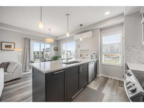 2302-19489 Main Street Se, Calgary, AB - Indoor Photo Showing Kitchen With Stainless Steel Kitchen With Double Sink With Upgraded Kitchen