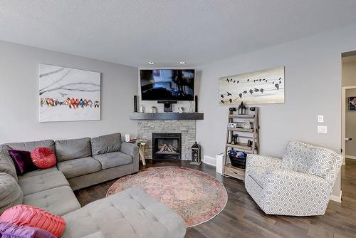282 Auburn Glen Drive Se, Calgary, AB - Indoor Photo Showing Living Room With Fireplace