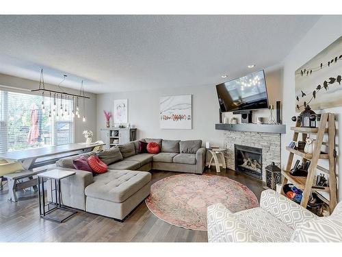 282 Auburn Glen Drive Se, Calgary, AB - Indoor Photo Showing Living Room With Fireplace
