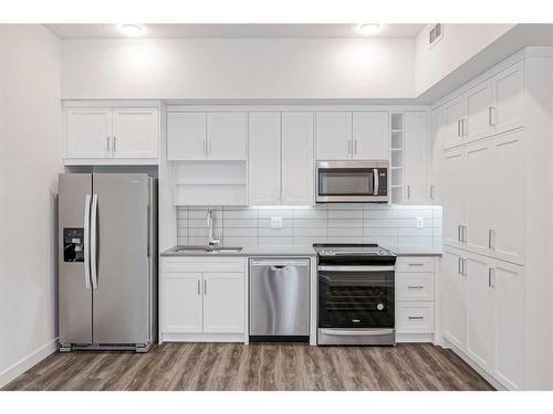 611-3932 University Avenue Nw, Calgary, AB - Indoor Photo Showing Kitchen With Stainless Steel Kitchen With Upgraded Kitchen