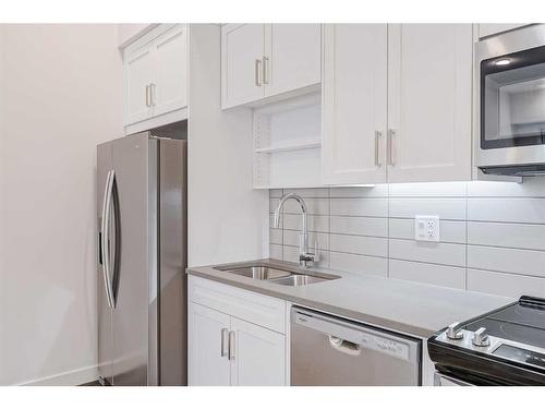 611-3932 University Avenue Nw, Calgary, AB - Indoor Photo Showing Kitchen With Double Sink With Upgraded Kitchen