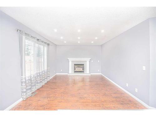 681 Coventry Drive, Calgary, AB - Indoor With Fireplace