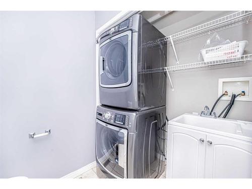 681 Coventry Drive, Calgary, AB - Indoor Photo Showing Laundry Room