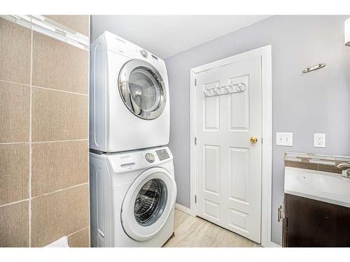 681 Coventry Drive, Calgary, AB - Indoor Photo Showing Laundry Room