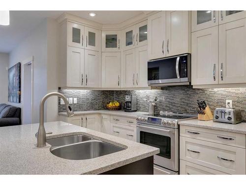 710 23 Avenue Nw, Calgary, AB - Indoor Photo Showing Kitchen With Double Sink With Upgraded Kitchen