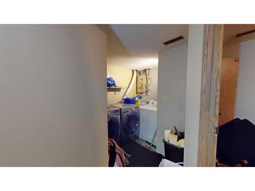 D-12 Manning Street, Red Deer, AB - Indoor Photo Showing Laundry Room