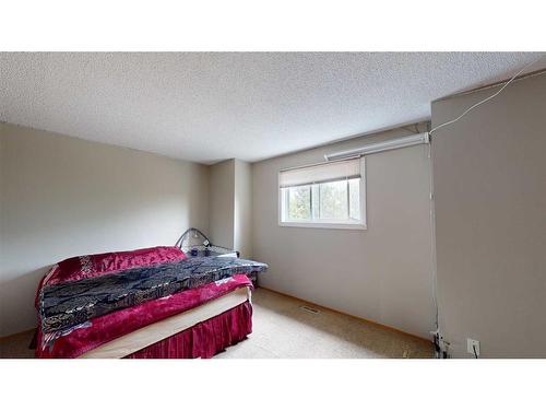 D-12 Manning Street, Red Deer, AB - Indoor Photo Showing Bedroom