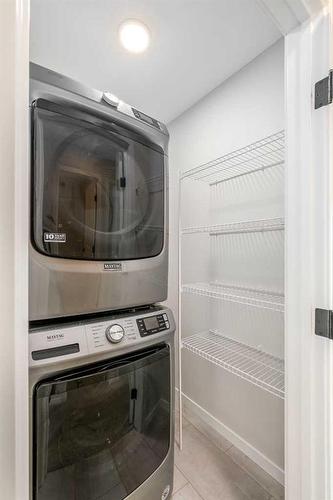 95 Sage Hill Lane Nw, Calgary, AB - Indoor Photo Showing Laundry Room