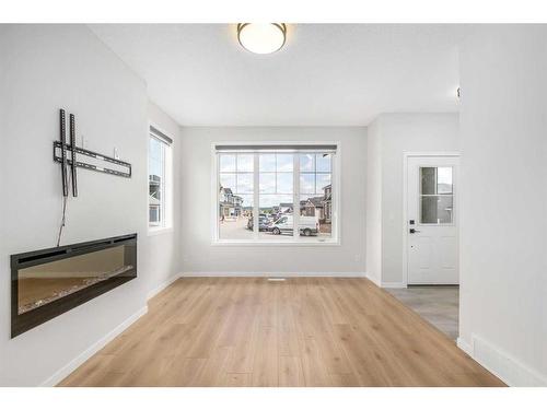 95 Sage Hill Lane Nw, Calgary, AB - Indoor Photo Showing Living Room With Fireplace