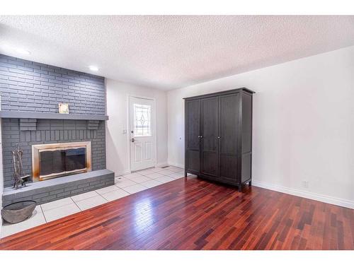 427 Brookpark Drive Sw, Calgary, AB - Indoor With Fireplace