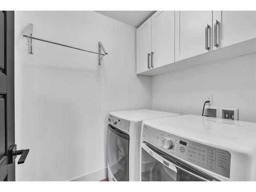 655 Wilderness Drive Se, Calgary, AB - Indoor Photo Showing Laundry Room
