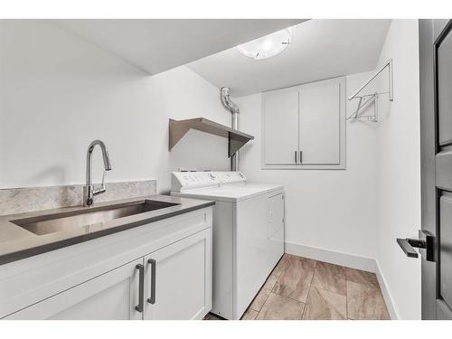 655 Wilderness Drive Se, Calgary, AB - Indoor Photo Showing Laundry Room