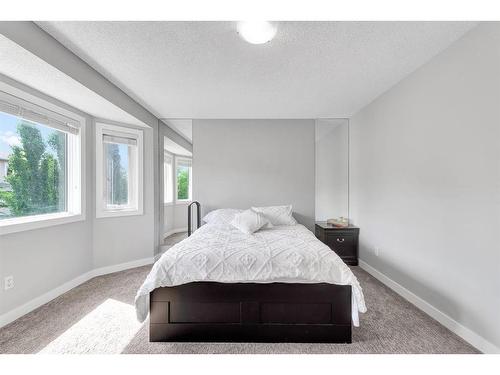 72 Arbour Ridge Way Nw, Calgary, AB - Indoor Photo Showing Bedroom
