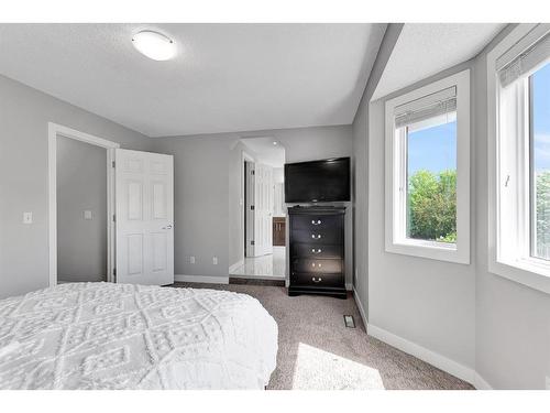 72 Arbour Ridge Way Nw, Calgary, AB - Indoor Photo Showing Bedroom