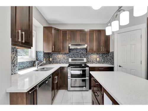 72 Arbour Ridge Way Nw, Calgary, AB - Indoor Photo Showing Kitchen With Double Sink