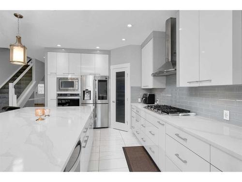 233 Crestmont Drive Sw, Calgary, AB - Indoor Photo Showing Kitchen With Stainless Steel Kitchen With Upgraded Kitchen