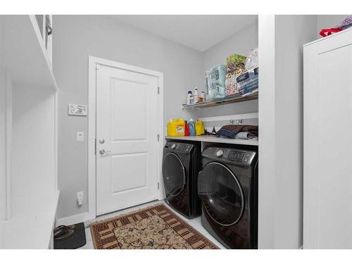 233 Crestmont Drive Sw, Calgary, AB - Indoor Photo Showing Laundry Room
