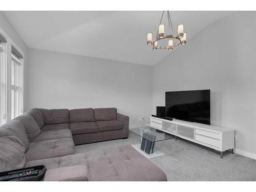 233 Crestmont Drive Sw, Calgary, AB - Indoor Photo Showing Living Room