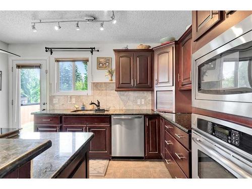82 Hawkwood Boulevard Nw, Calgary, AB - Indoor Photo Showing Kitchen With Stainless Steel Kitchen