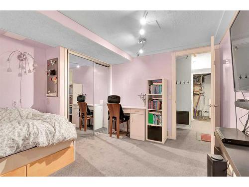 82 Hawkwood Boulevard Nw, Calgary, AB - Indoor Photo Showing Bedroom