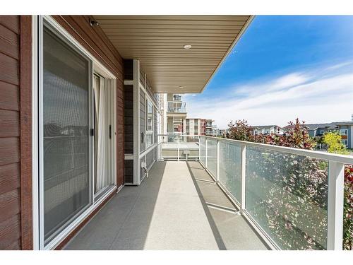 201-360 Harvest Hills Common Ne, Calgary, AB - Outdoor With Balcony With Exterior