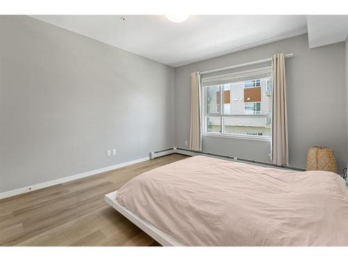 201-360 Harvest Hills Common Ne, Calgary, AB - Indoor Photo Showing Bedroom