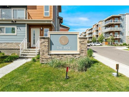 201-360 Harvest Hills Common Ne, Calgary, AB - Outdoor With Balcony With Facade