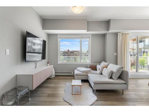 201-360 Harvest Hills Common Ne, Calgary, AB - Indoor Photo Showing Living Room