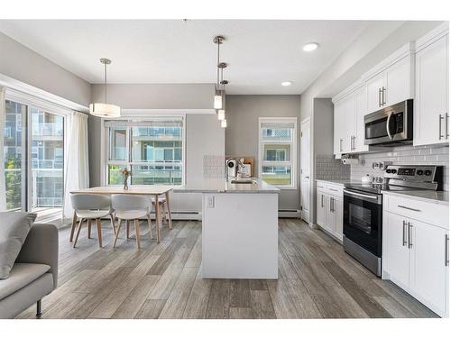 201-360 Harvest Hills Common Ne, Calgary, AB - Indoor Photo Showing Kitchen With Upgraded Kitchen