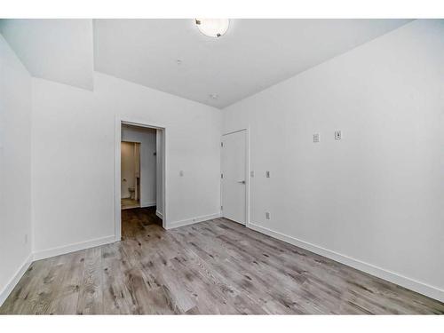 2211-681 Savanna Boulevard Ne, Calgary, AB - Indoor Photo Showing Other Room