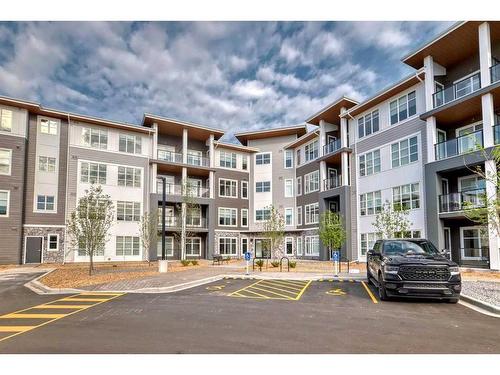 2211-681 Savanna Boulevard Ne, Calgary, AB - Outdoor With Balcony With Facade