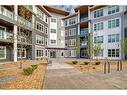 2211-681 Savanna Boulevard Ne, Calgary, AB  - Outdoor With Balcony With Facade 