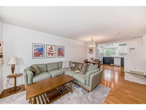 74 Tuscany Springs Gardens Nw, Calgary, AB - Indoor Photo Showing Living Room