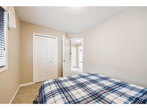 456 Hidden Creek Boulevard Nw, Calgary, AB - Indoor Photo Showing Bedroom