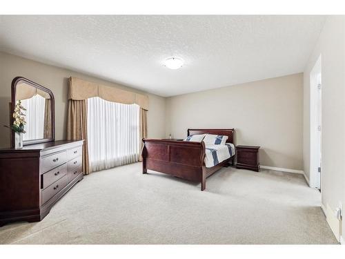 456 Hidden Creek Boulevard Nw, Calgary, AB - Indoor Photo Showing Bedroom