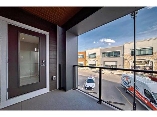 2219-681 Savanna Boulevard, Calgary, AB - Outdoor With Balcony With Exterior